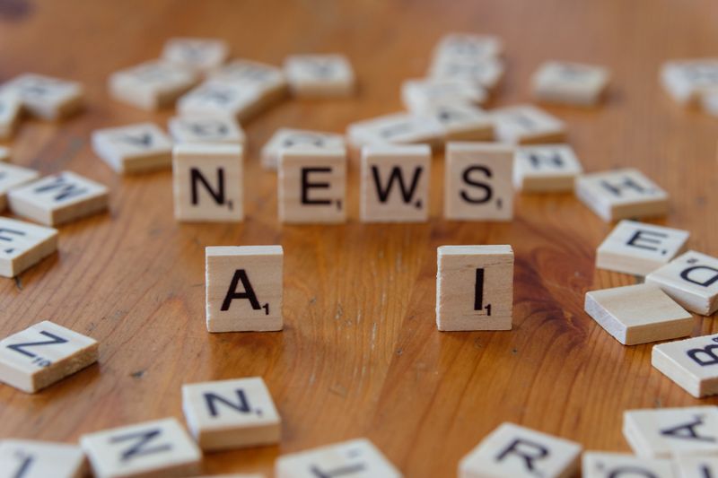 Плитки з написами AI і NEWS